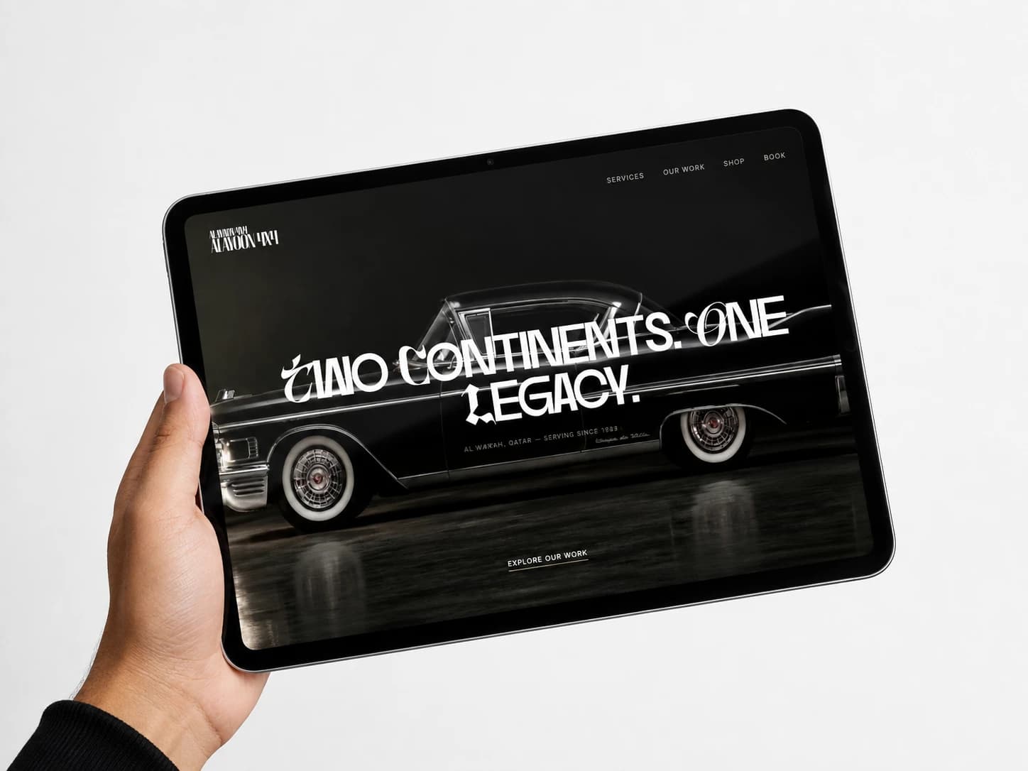 Al Ayoon classic-car website displayed on a tablet